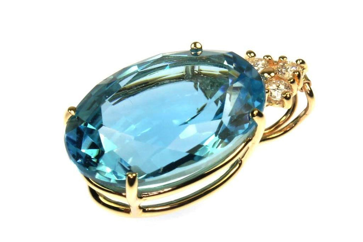 Blue Topaz and Diamond Pendant