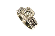 .50ct Emerald Cut Center with a 1.10ctw Diamond Halo Setting